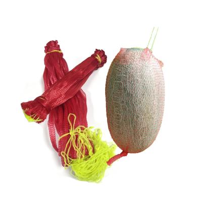 China Cheap Plastic Cantaloupe Vegetable Fold Net Bag Free Sample Mesh Agriculture Fruit Mesh Net Twine Bag L60cm for sale