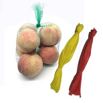 China Agriculture MOQ 100PCS L35cm plastic packing 0.5kg 1kg fruit mesh bag mesh bag vegetable making bag for sale