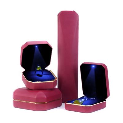 China Wholesale Luxury Plastic LED Jewelry Box Wedding Ring Boxes With Led Light for sale