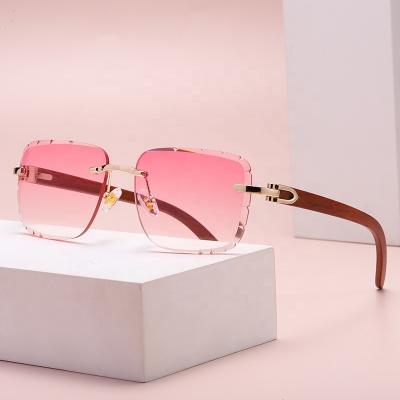 China 2022 New Summer New Square Glass Fashion Sunglasses Wooden Frame Design Wooden Frame Buffalo Horn Frameless Rectangular Pink Rimless Sunglasses Men Women for sale