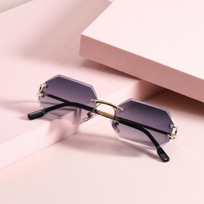 China 2022 Fashion Luxury Hexagon Sunglasses Men Fashion UV400 Frame Shades Small Rimless Sunglasses Women Unisex for sale