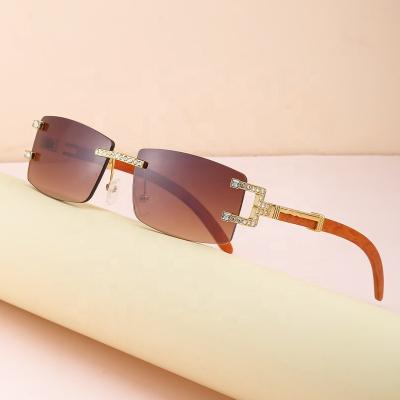 China Fashion sunglasses 2021 hot selling personal bling designer brand designer sunglasses rhinestone rhinestone shades famous glasses with diamond women for sale