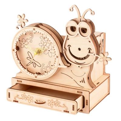 China Music/voice wooden jigsaw puzzle shaped jigsaw snail house cogs music box irregular wooden animal pen holder for sale