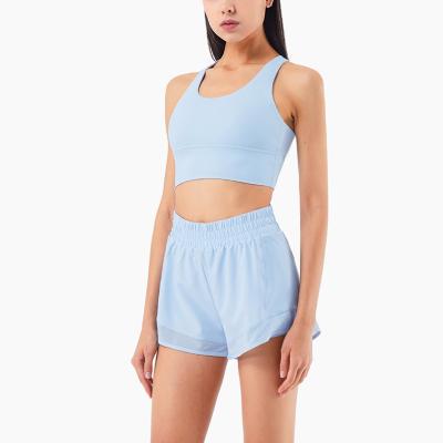 China Breathable mesh fitness stitching sports shorts high elastic waist with pocket fashion yoga pants sports shorts women wholesale for sale