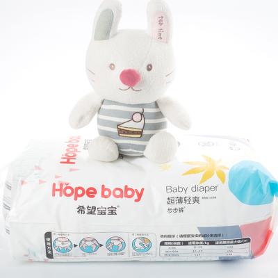 China Hopebaby OEM Odm Popok Celana Bayi Printed Baby Urine Running Diapers Pants Disposable Baby Diapers Pants for sale