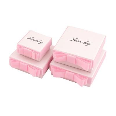 China Handmade Creative Pink Bow Jewelery Box Ring Necklace Bracelet Jewelry Storage Gift Flower Packaging Box Cardboard Lens Box Pink Socks for sale