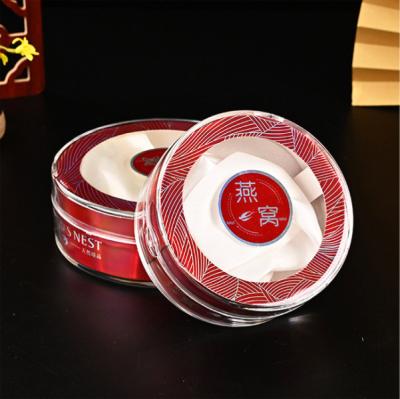 China Handmade round plastic box food storage container 50g 100g birdnest box with lock en venta