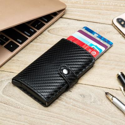 China Amazon Stock Fashion Button Men Card Holder Pop Carbon Fiber Hot Slim Wallet for sale