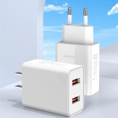 China Dual USB Ports US EU Charging Plug 5V2A 10W New Dual USB Block Power Supply Wall Charger Adapter Phone Charger Fast Charging Stand for sale