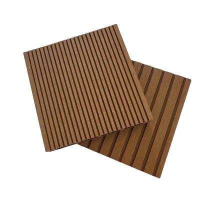 China Factory supply moisture proof embossed composite wood and plastic composite embossed tiles interlocking balcony tiles flooring for sale