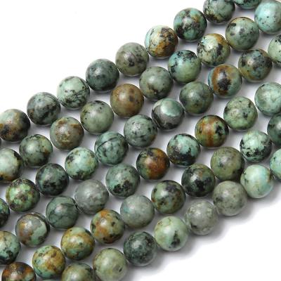 China Fashional Keepsake Gifts Wholesale Natural African Turquoise Round Stone Loose Beads For Gemstone Bracelet Making for sale