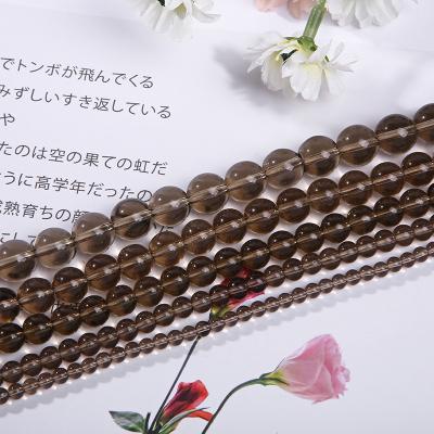 China Fashional Souvenir Gifts Factory Loose Beads Tawny Crystal Volcanic Beads Round Stone For Bracelet Jewelry Diy Making for sale