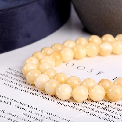 China Fashional Keepsake Gifts High Quality Natural Yellow Jade Round Beads Loose Stone Beads For Diy Jewelry for sale