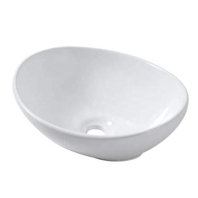 China Modern Oval Bathroom Vessel Sink Above Counter White Porcelain Ceramic Bathroom Vessel Vanity Sink for sale