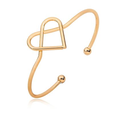 China QIHE Free Sample Trendy IP Plated Gold Lucky Cuff Heart Knot Bracelet Bangle for sale