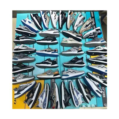 China Fashion Trend Mixed Type Stock Lots Quality Assurance Wholesale Football Sports Running Loffer Shoes Men for sale