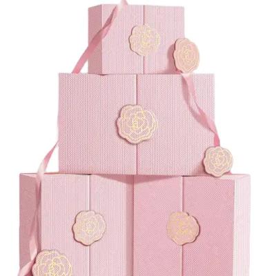 China Recyclable Hot selling light pink customized magnetic special cardboard perfume box for sale