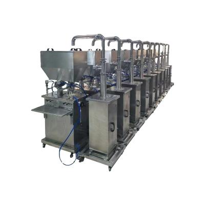 China Food Semi-automatic Cosmetic Small Cream Ointment Paste Liquid Soap Packaging Vertical Filling Machine For Pasta With Hydraulic Chain for sale