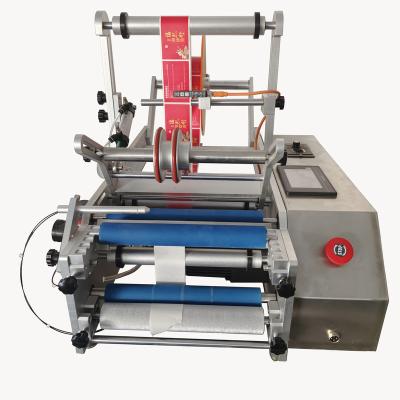 China Automatic Food Flat Surface Bag Pouch Paging Round Bottle Labeling Machine for sale