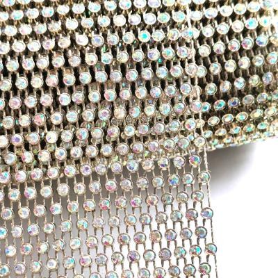 China Bags S148 Gold Plastic Rhinestone Mesh Net Rhinestone Mesh Fabric Easy To Cut Trimming For Making Dress Fabric for sale