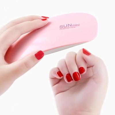 China Professional Mini Table Rechargeable Cordless Sun 48W Beauty Brush Curing Led UV Gel Nail Lamp 12V for sale