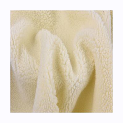 China Flame Retardant Premium Home Textile Blanket Fabric Comfortable 100% Polyester Fleece Fabric for sale