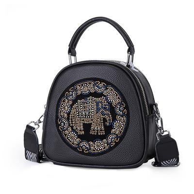 China Wholesale Cheap Luxury Real PU Leather Cross - Body Bag Lychee Grain Elephant Rivets Handbags For Women for sale