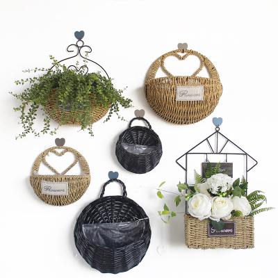 China Natural Handmade Country Wall Decor Flower Cane Basket Cane Hanging Planter Basket for sale