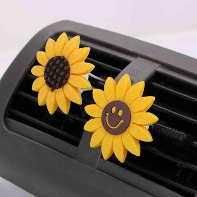 China Christmas Gift Cute Free Shipping Cute Smile Face Car Accessories Exhale Staples Sunflower Car Air Freshener for sale