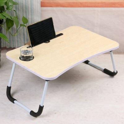 China Hot Selling Portable Ergonomic Folding Laptop Desk Table Stand Portable Adjustable Stand For Bed Sofa for sale