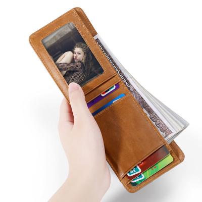 China Modern RFID Blocking Minimalist Small Card Holder Fashion Money Clip Genuine Leather Men's Slim Wallet for sale