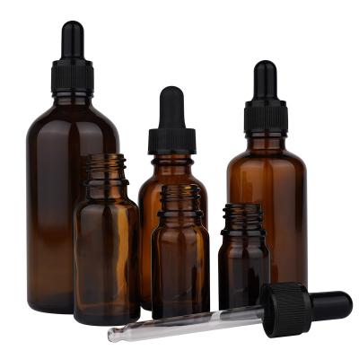 China Fast Delivery Luxury Amber Glass Essential Oil Bottle 5ml 10ml 15ml 20ml 30ml 50ml 100ml Comestic With Dropper Cap for sale