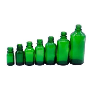 China Non Spill 30ml Green Glass Essential Oil Bottle With Gold Cap And Glass Dropper for sale