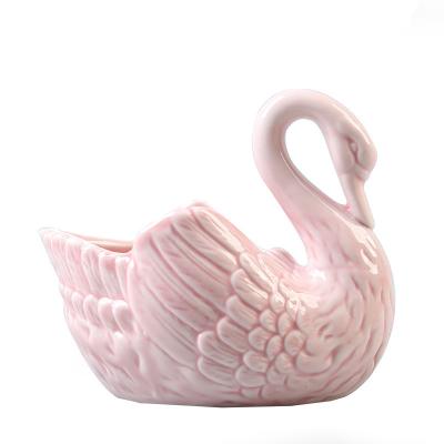 China Home Decoration Creative Ceramic Swan Shape Tealight Holder Candle Holder for sale