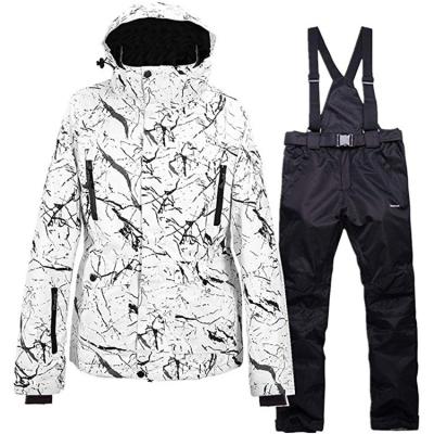 China Waterproof Detachable Jacket Bib Machining Pants Waterproof Women's Warm Ski Suit for sale