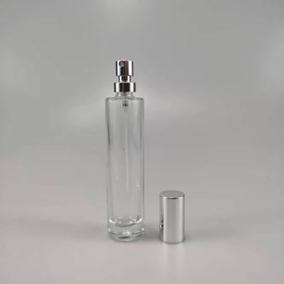 China ODM OEM Druck 35ml Runde Glas Parfümflasche mit Gold Silber Pump Sprayer zu verkaufen