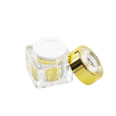 China Reusable Cosmetic Packaging Container 10g Gold Eye Cream Acrylic Plastic Jar Material for sale