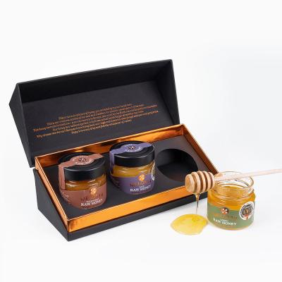 China Kundenspezifischer Druckklappen-Kasten, der für Kamm-Satz Honey Bee Bottles 3pcs verpackt zu verkaufen