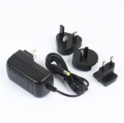 China Interchangeable Jack Power Supply 12V 1.5A Adapter Tary-E18W for sale