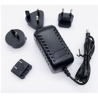 China 5V 2A EU R-U US Plug Power Adapter / 12V 0.6A Interchangeable Interchangeable Power Supply / Main Adapter 9V 1.5A Tary-E12W Conversion Power for sale