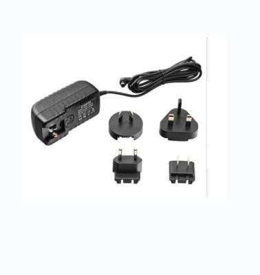 China dc output type 12v1a interchangeable power adapter with British Eu US Au models/12v 1a interchangeable plug power adapter Tary-1201000 for sale