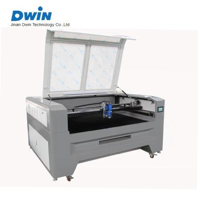 China Laser CUTTING Automatic Focus CO2 Laser Cutting Machine For Metal And Nonmetal DW1390 for sale