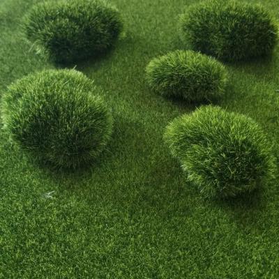 China Natural Grass Moss Artificial Rocks Decorative Green Moss Covered Stones Ball Artificial Fake Touch Grass for sale