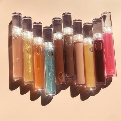 China Small Lip Oil Private Label Gold Vitamin E Lip Oil Waterproof Clear Lip Gloss Organic Essential Oil for sale