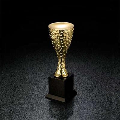 China Custom creative high quality china new design trophy metal cup award champion trophies for sale