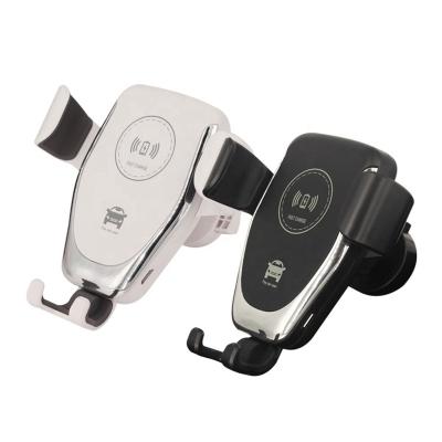 China Mobile Phone Gravity Wireless Car Mount Charger With Air Vent Phone Holder For Samsung And Iphone for sale