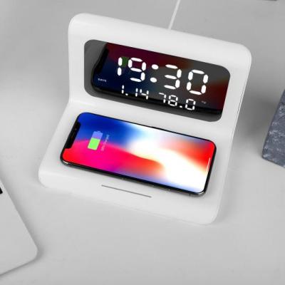 China Multifunctional 10w mobile phone wireless charger with alarm clock and temperature display support for sale