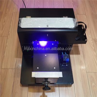 China Small format l800 direct inkjet printer UV printer yes max printing a4 for bottle cup for sale