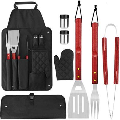 China Hot Selling Easily Cleaned Stainless Steel 7pcs BBQ Grills Accessories Portable Grilling Tool With Apron for sale