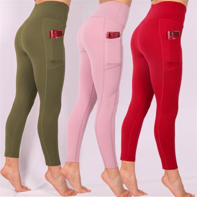 China New Design Breathable Custom Fitness Wear Yoga Tights Women Running Tights Pants Sporty Gaiters With Pocket for sale